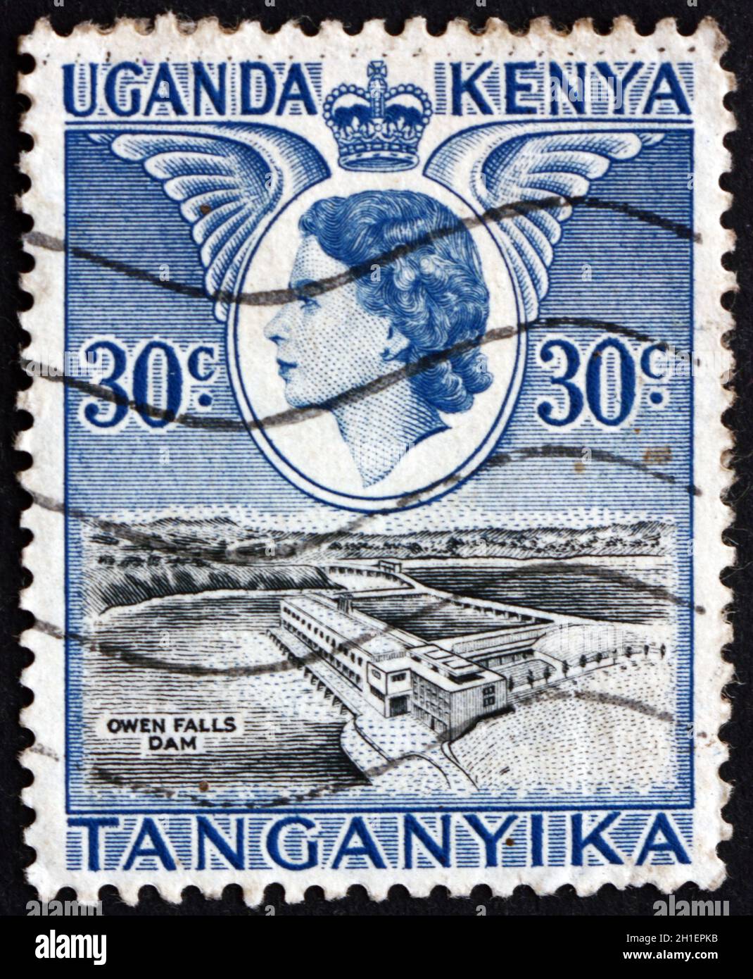 EAST AFRICAN POSTAL UNION - CIRCA 1954: a stamp printed in the East African Postal Union (Kenya, Uganda, Tanganyika) shows Owen falls dam, circa 1954 Stock Photo
