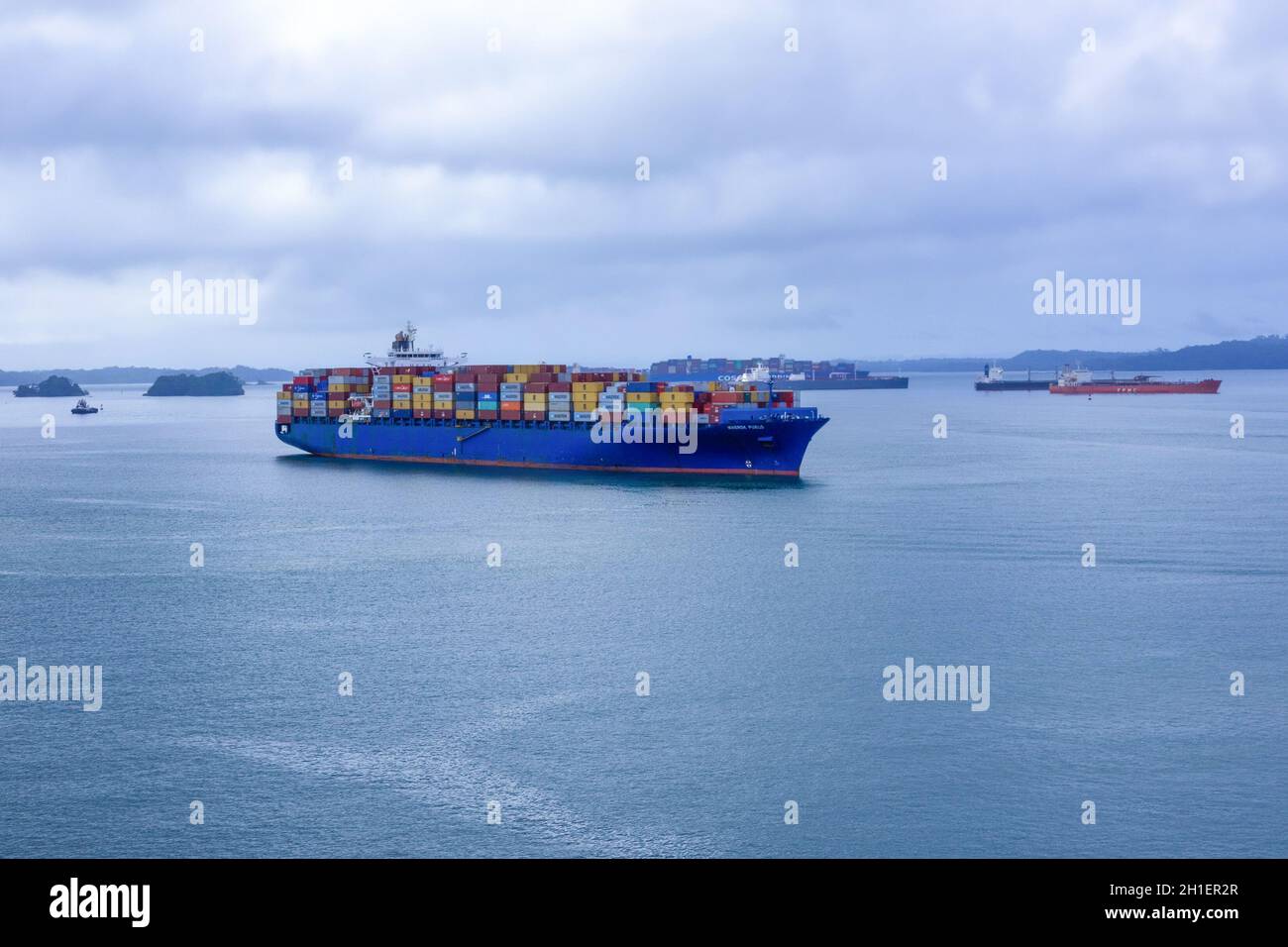 Panama Canal, Panama - December 7, 2019: Maersk Line container cargo ship at Gatun lake near Panama Canal. It is the world's largest container shippin Stock Photo