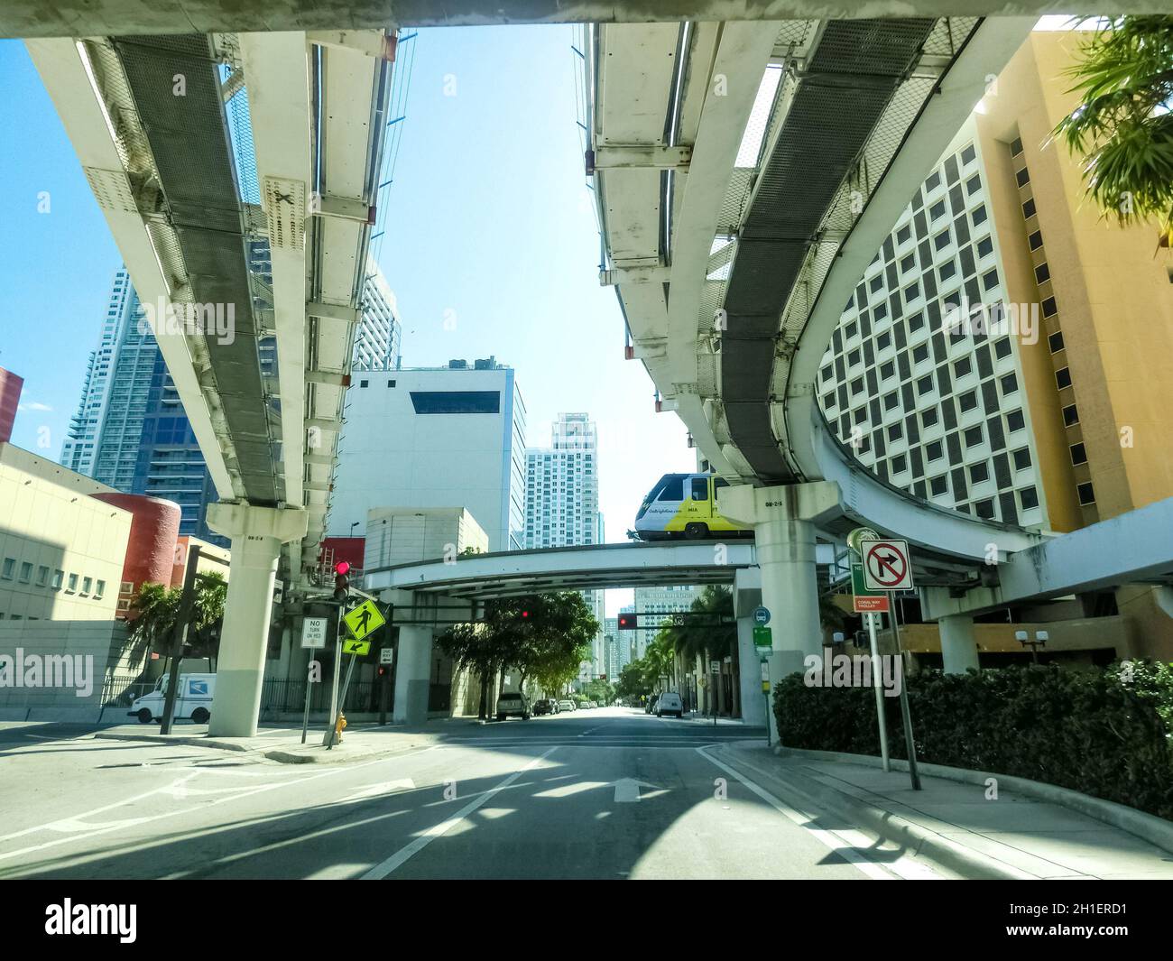 Miami, USA - November 30, 2019: Downtown Miami cityscape view with condos and office buildings against blue sky. Stock Photo