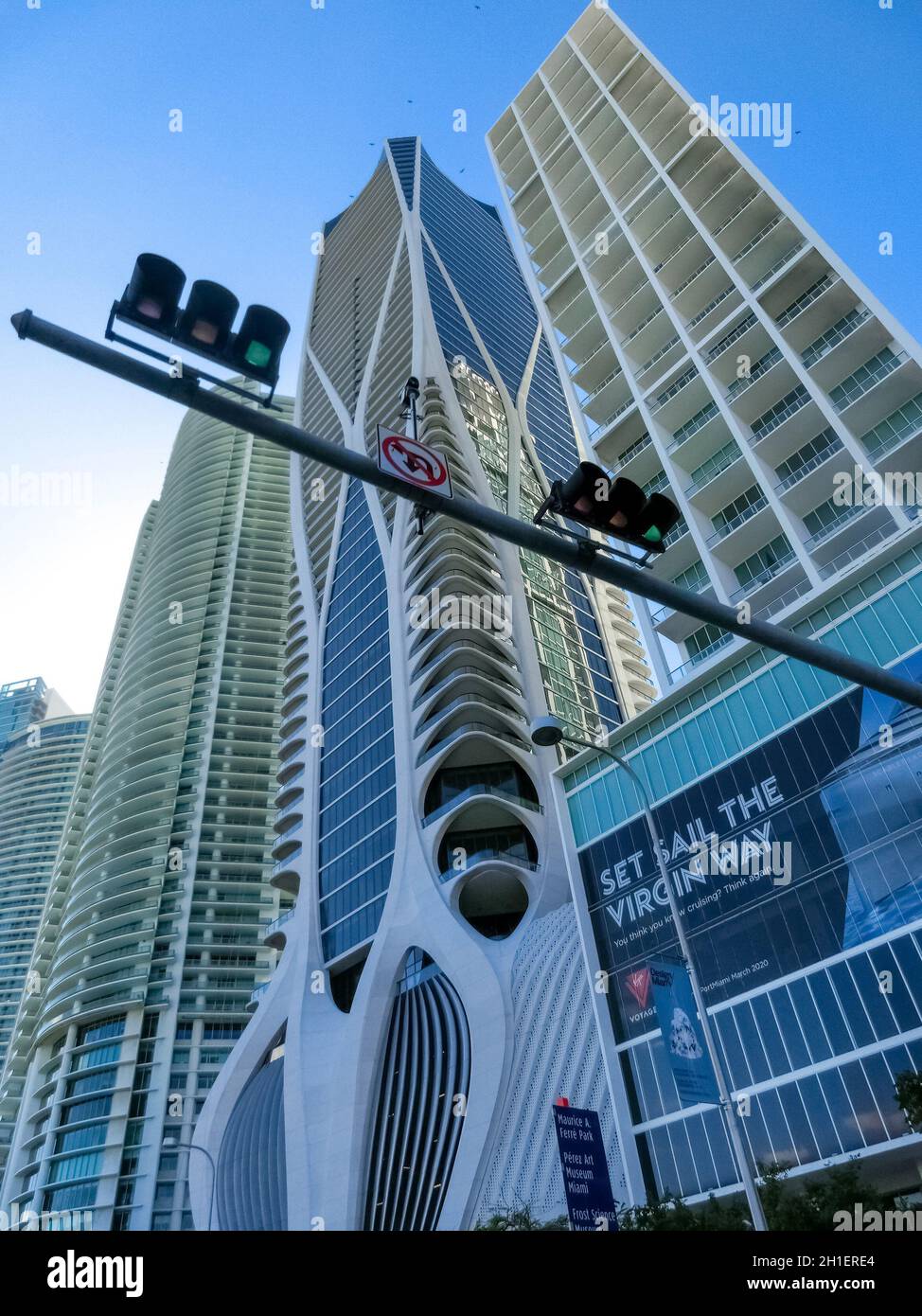 Miami, USA - November 30, 2019: Downtown Miami cityscape view with condos and office buildings against blue sky. Stock Photo