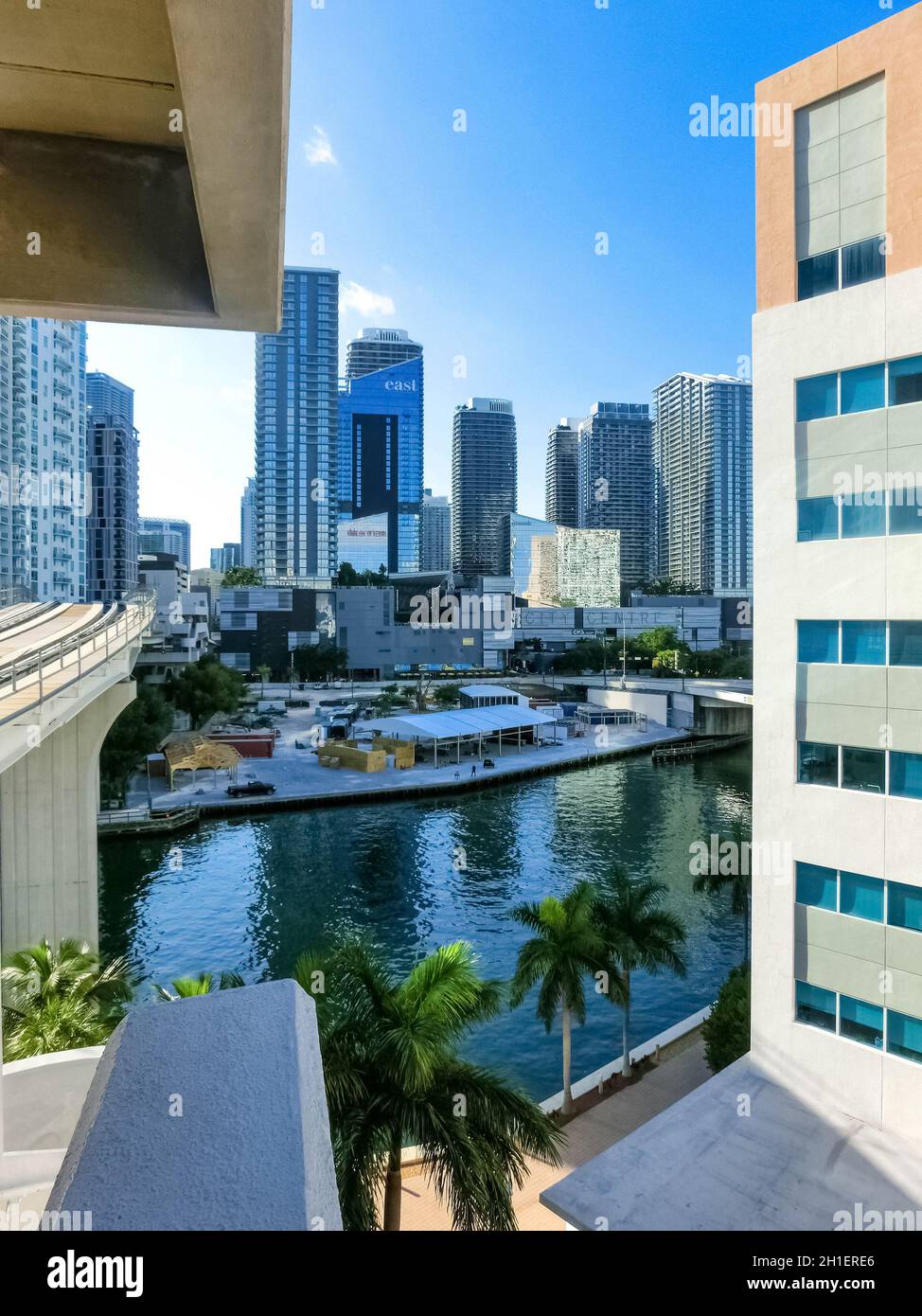 Miami, USA - November 30, 2019: Downtown Miami cityscape view with condos and office buildings against blue sky. Stock Photo