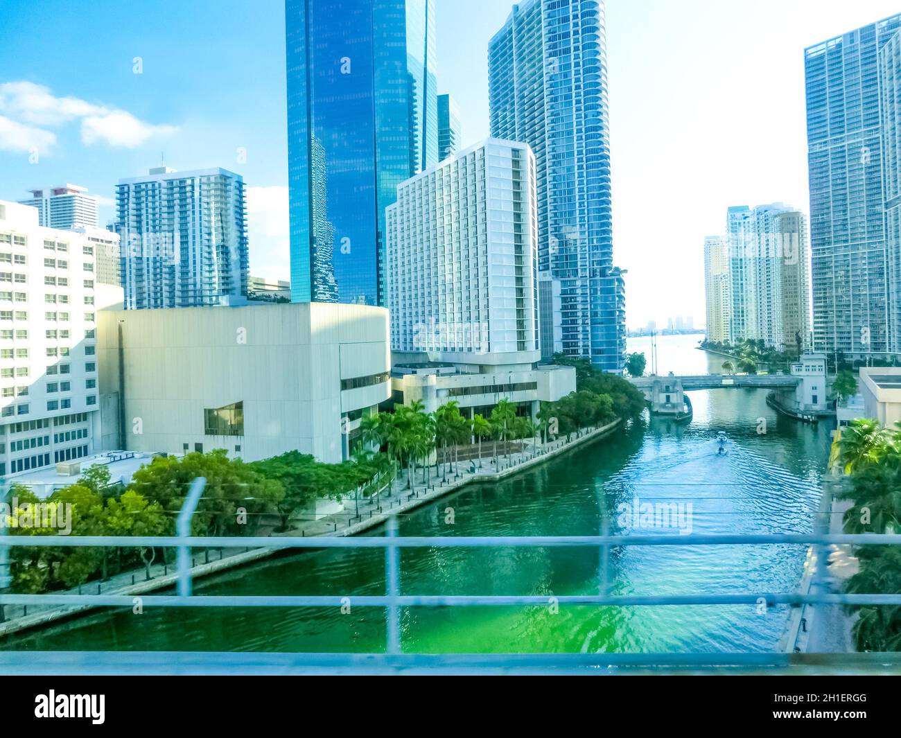 Miami, USA - November 30, 2019: Downtown Miami cityscape view with condos and office buildings against blue sky. Stock Photo