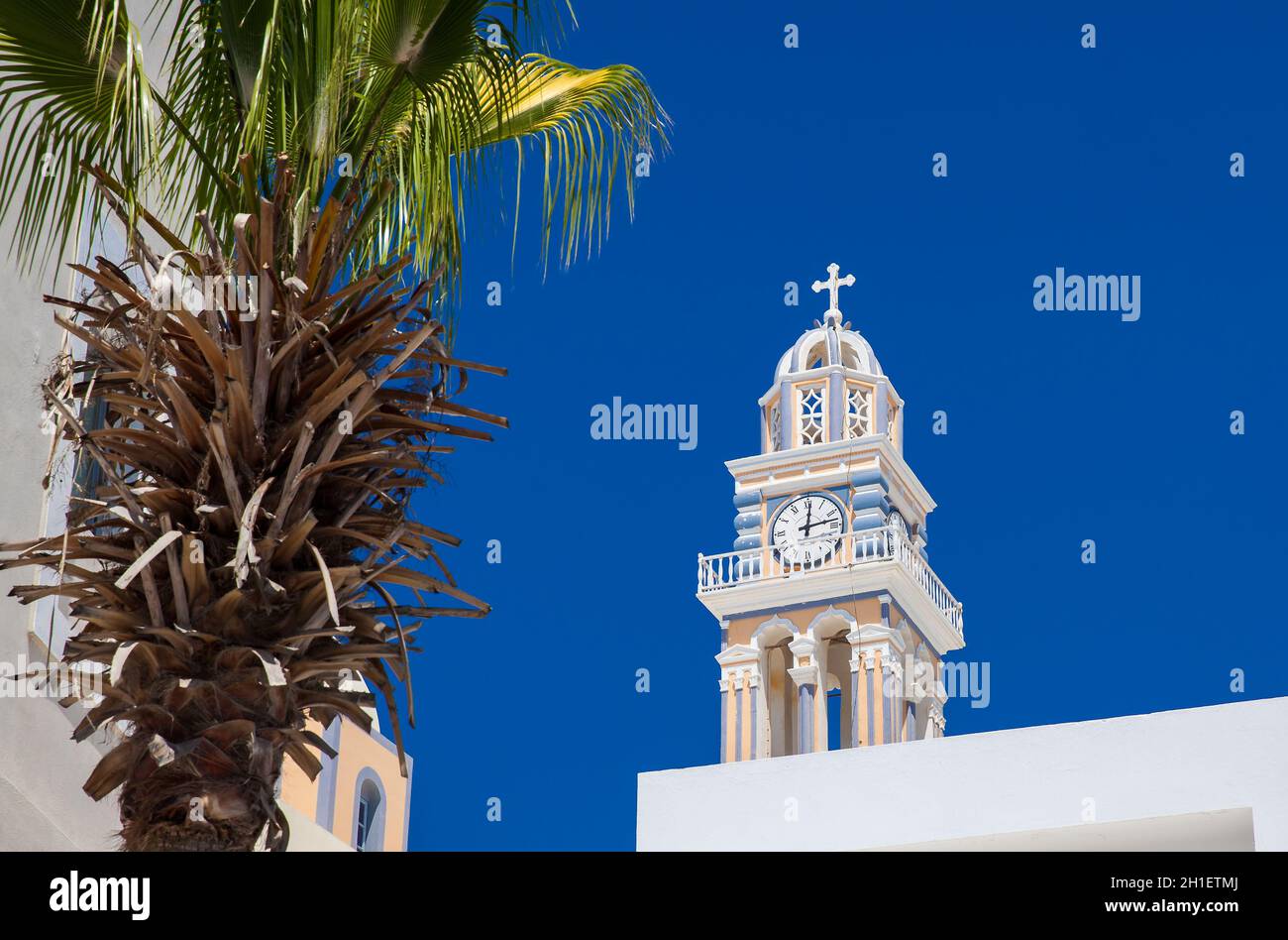 Bell tower of the Saint John the Baptist church in the city of Fira in ...