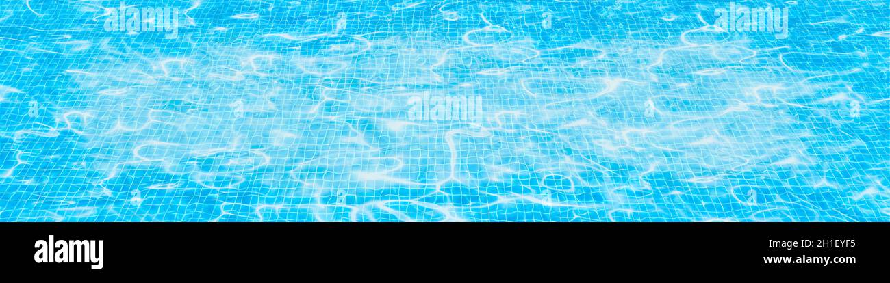 Clear pool water ripples, Blue water surface with waves background hero header Stock Photo