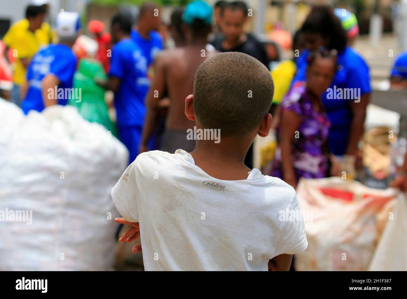 salvador, bahia / brazil - march 2, 2014: 11 year old boy is seen at the Recycling Center in Barra neighborhood in Salvador. characterizing child labo Stock Photo