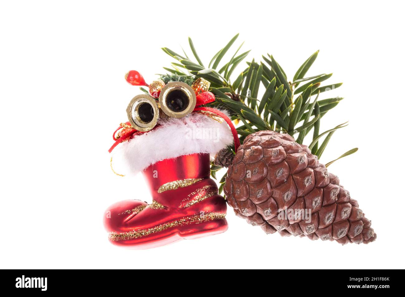 closeup Christmas ornament with pine cone isolated on white background ...