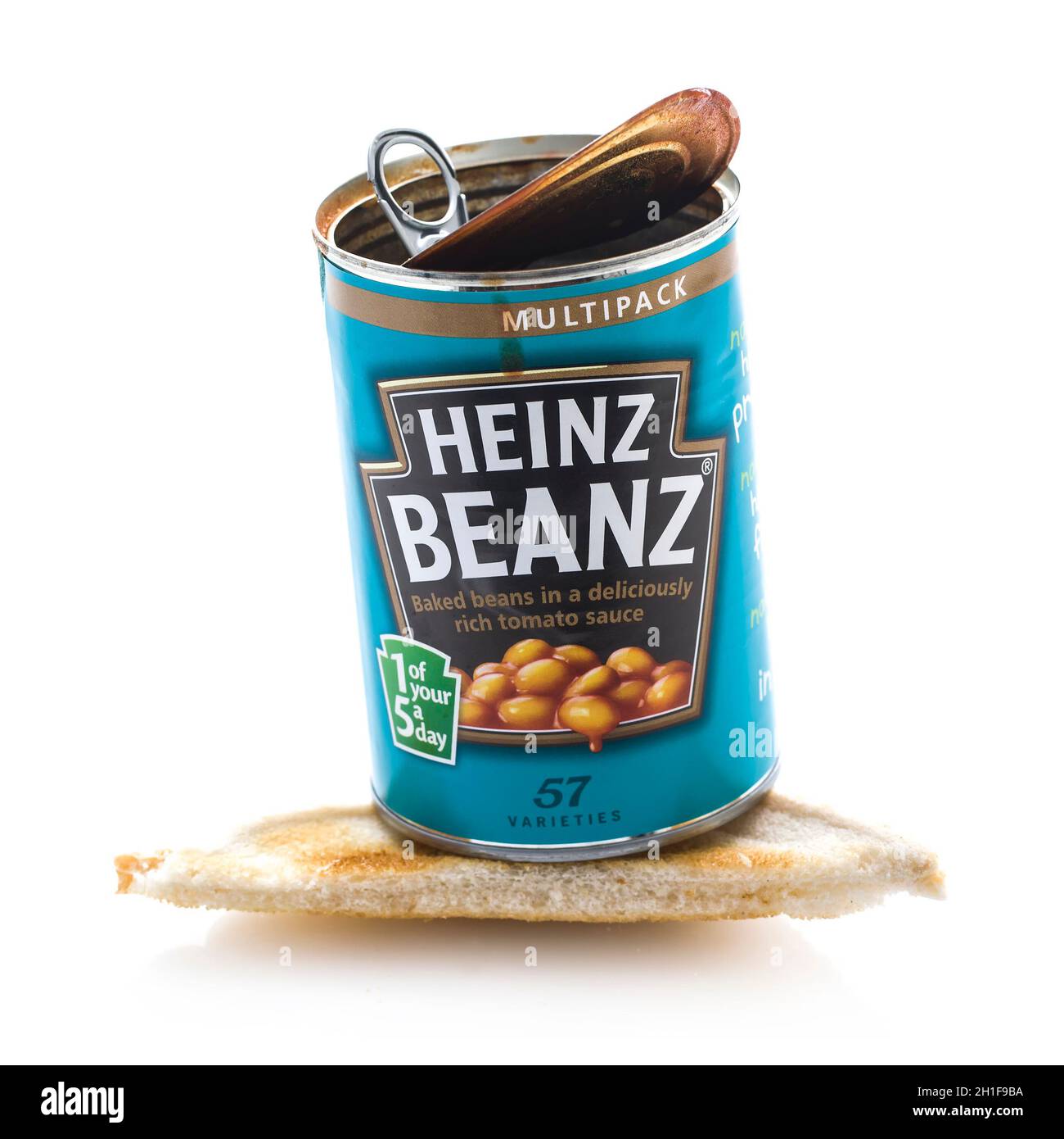 SWINDON, UK - AUGUST 10, 2014: Heinz Baked Beanz on Toast On a White Background Stock Photo
