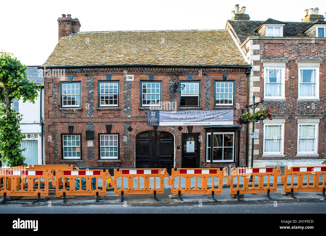ROYAL WOOTTON BASSETT, UK - JUNE 27, 2015 The Cross Keys has been extensively refurbished following a fire in 2013, The Cross Keys was built in 1742 a Stock Photo