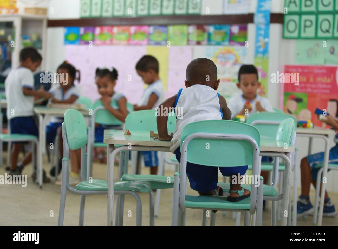 salvador, bahia / brazil - may19, 2016: children are seen in a classroom at the Tereza Mata Pires Municipal Center, in the Alto do Cabrito neighborhoo Stock Photo