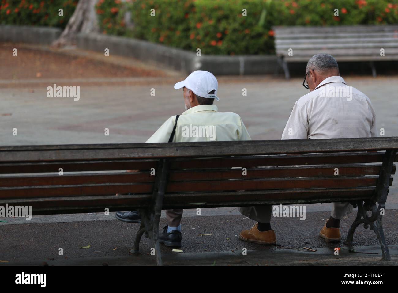salvador, bahia / brazil - april 11, 2018: Elderly people are seen on the square bench in the city of Salvador. *** Local Caption *** Stock Photo