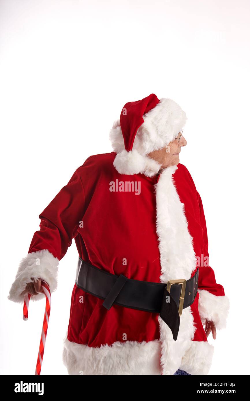 an old woman in a Santa Claus costume looking to one side Stock Photo ...