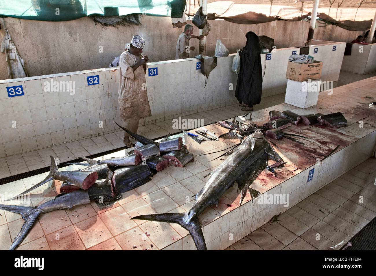 Muscat, Oman. fish market at Muttrah, town center of Muscat, Oman. Several tuna and other fish on stalls. Stock Photo