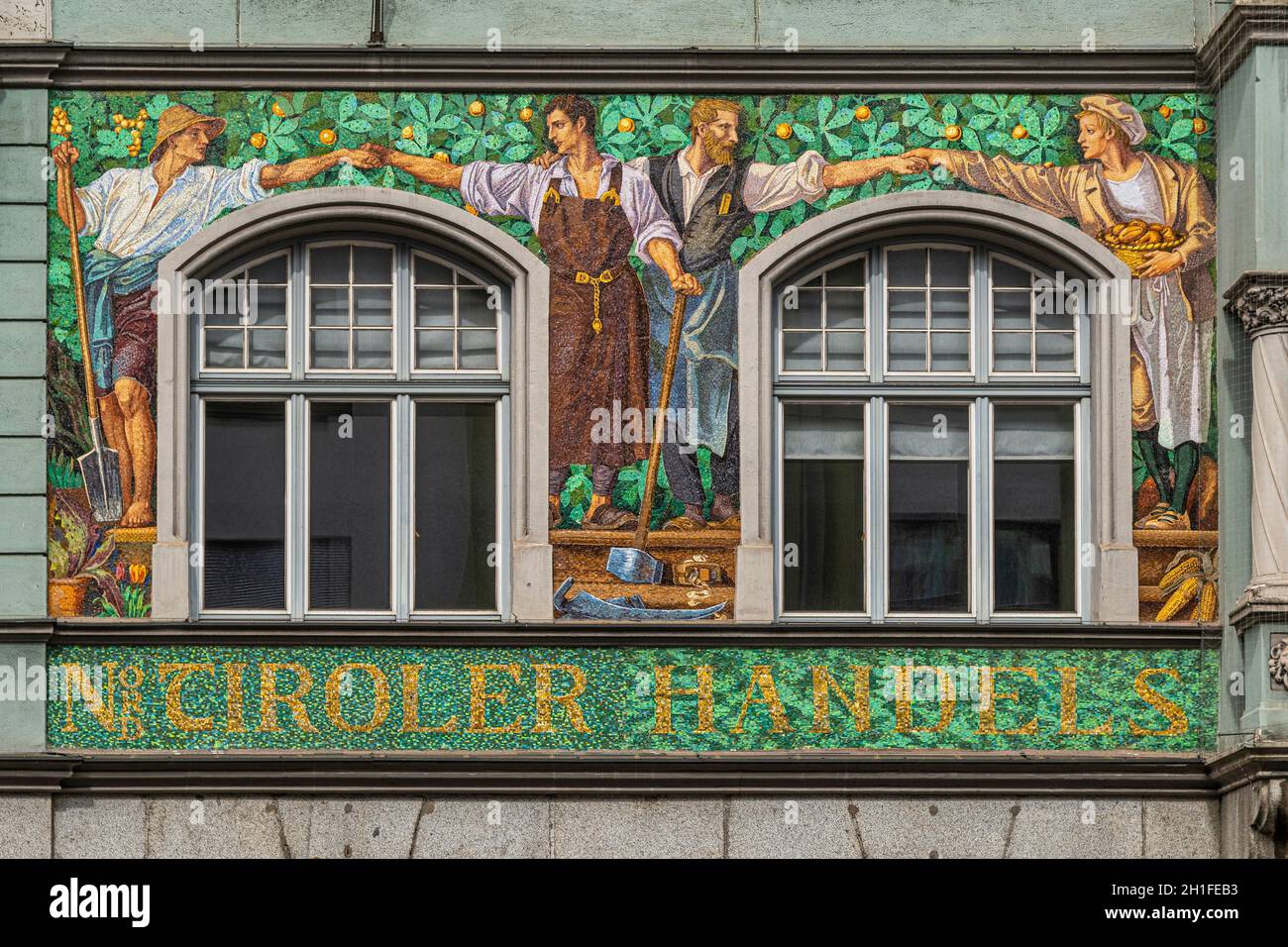 Detail of the mosaics decorating the facade of the building of the North Tyrol Chamber of Commerce. Innsbruck, North Tyrol, Austria, Europe Stock Photo
