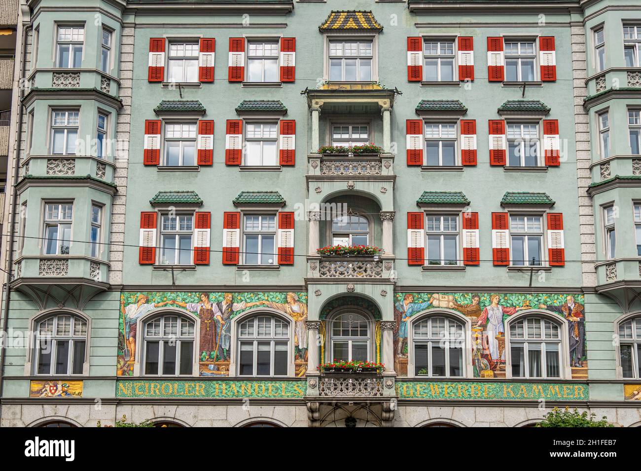 Decorated facade of the North Tyrolean Chamber of Commerce building in Innsbruck. Innsbruck, North Tyrol, Austria, Europe Stock Photo