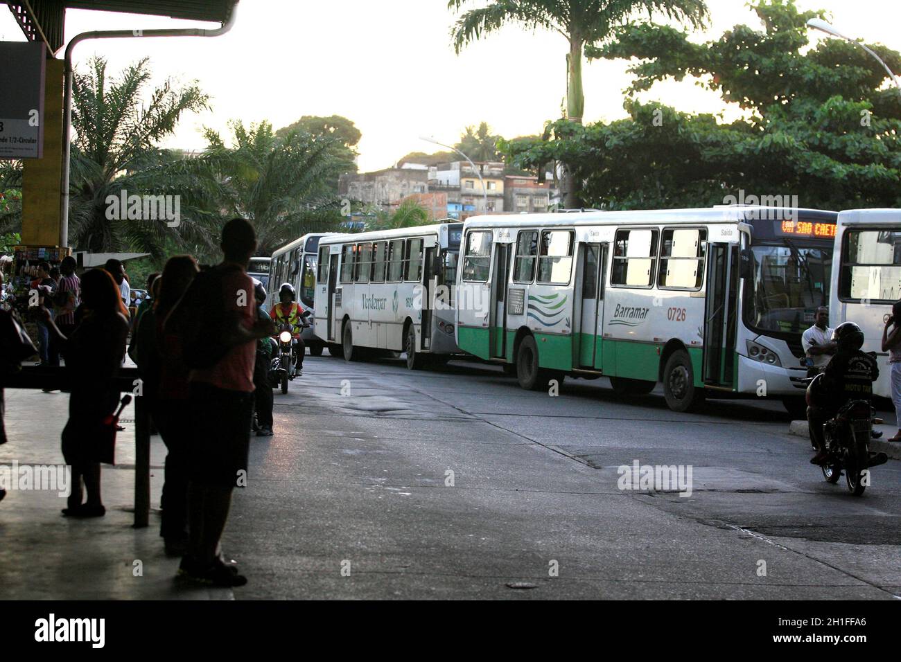 salvador, bahia / brazil - may 26, 2014: Queue of buses stopped near the entrance of Piraja Station in Salvador, is seen during public transport drive Stock Photo
