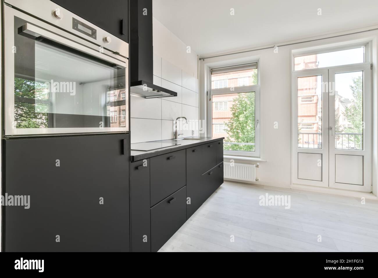 Black and white modern kitchen interior design Stock Photo - Alamy