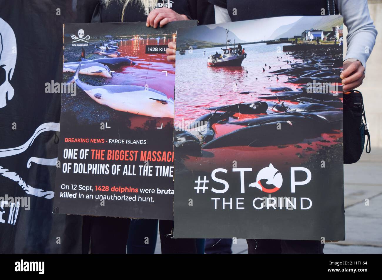 London, UK. 16th October 2021. Protesters in Trafalgar Square. Sea Shepherd and other activists marched through Westminster, calling for an end to the slaughter of dolphins and whales in Faroe Islands and Taiji, Japan. Stock Photo