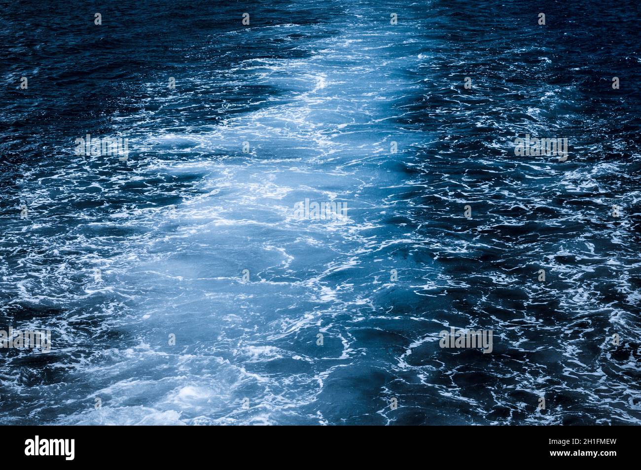 Nature background, dark blue ocean with white spray Stock Photo Alamy