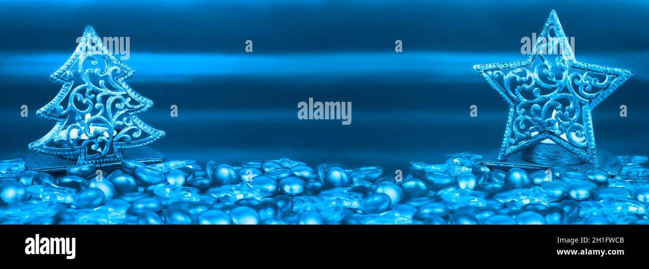 Blue Christmas star & tree shaped tea light holder with clear glass