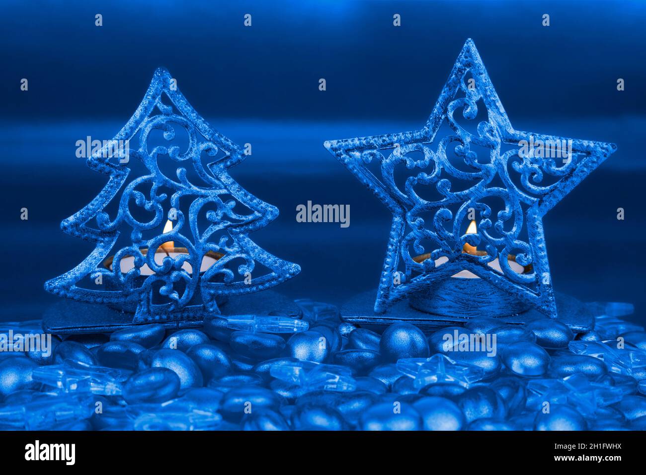 Christmas tree and Star shaped tea light holders with blue clear glass