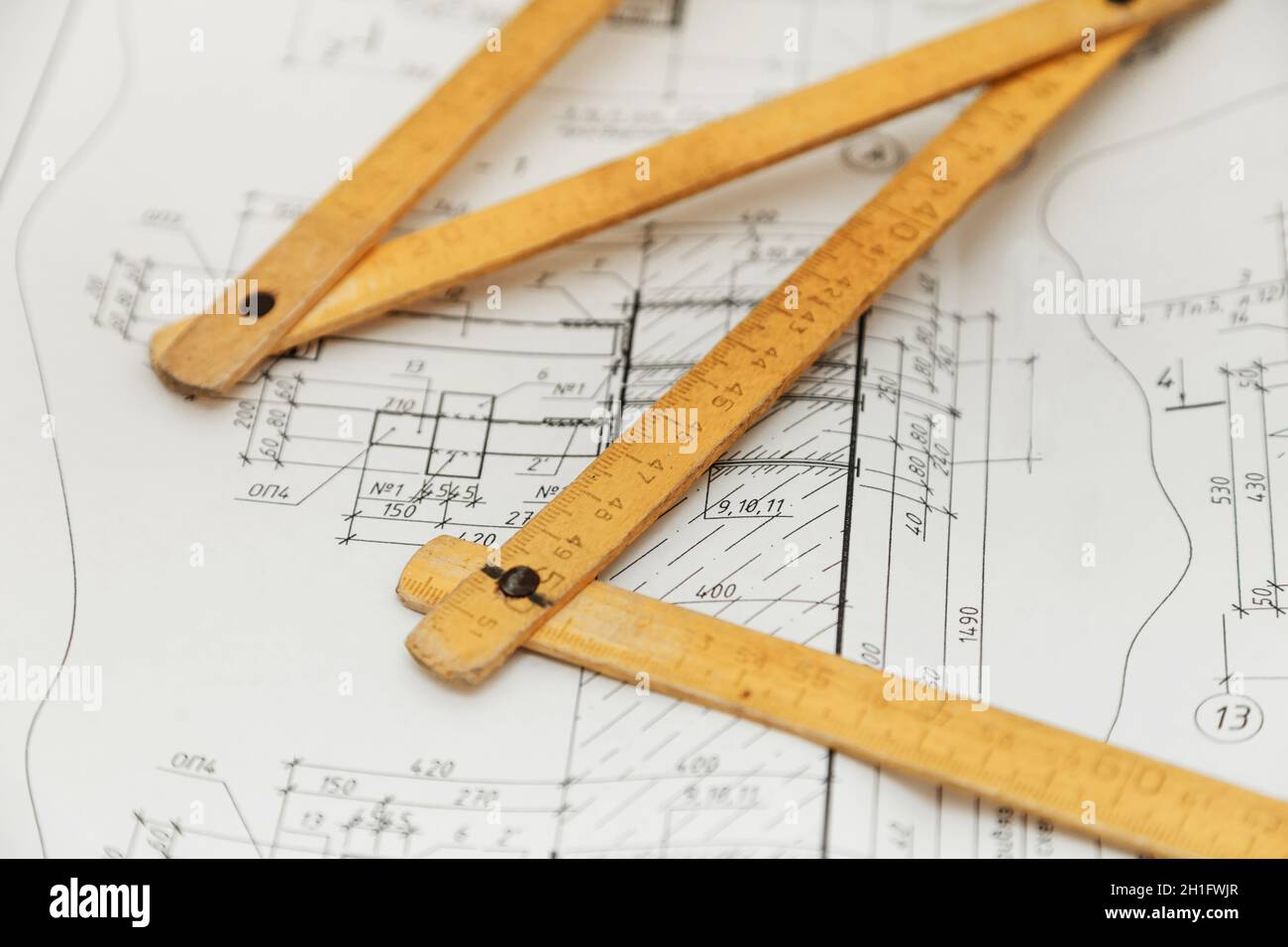 folding ruler on engineer drawing designs Stock Photo Alamy