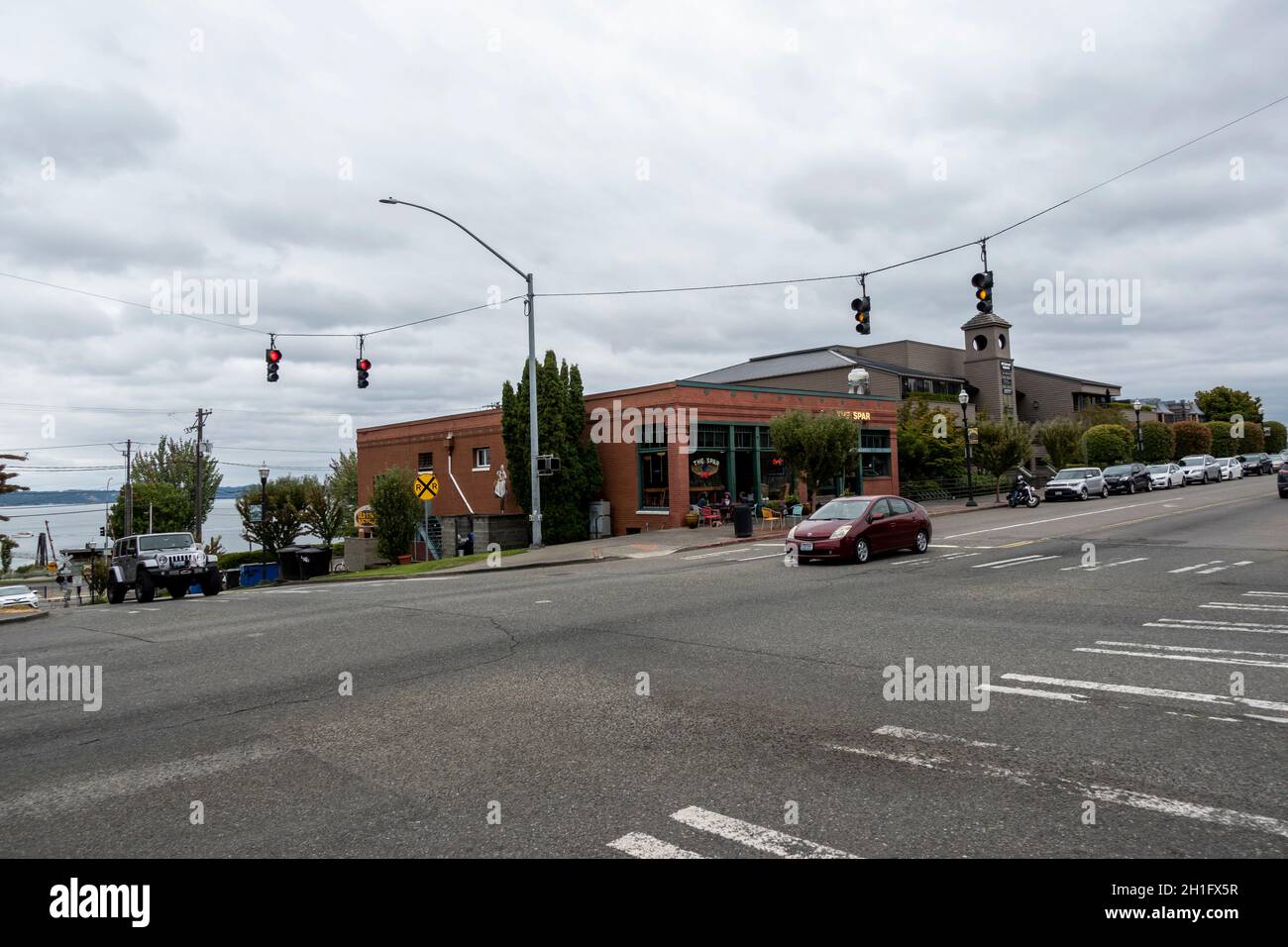 Tacoma, WA USA - circa August 2021: Street view of traffic in Old Town Tacoma on an overcast day. Stock Photo