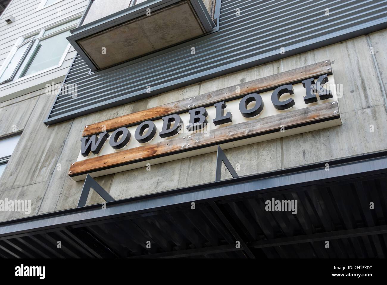 Redmond, WA USA - circa August 2021: Low angle view of the entrance to Woodblock upscale restaurant. Stock Photo