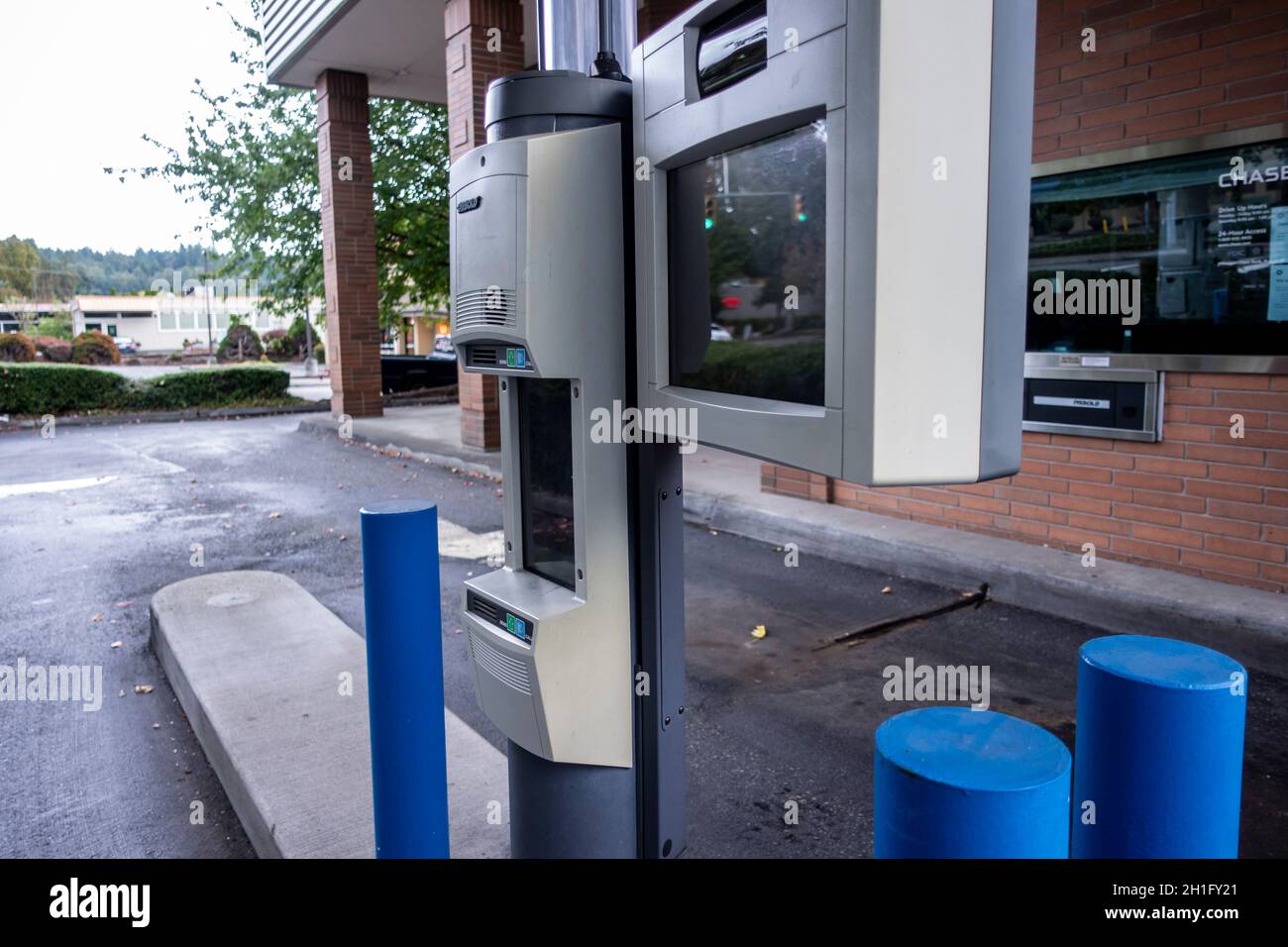 Woodinville, WA USA - circa September 2021: Street view of a drive thru bank deposit station at a Chase Bank. Stock Photo