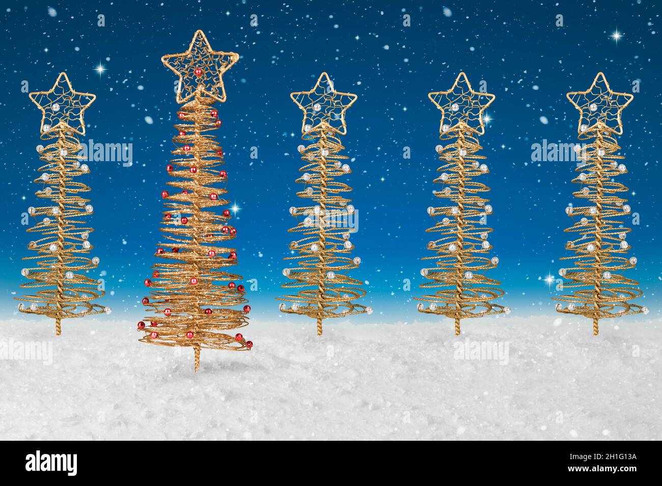 Gold wire tree Christmas Decoration on a fake snow background Stock ...