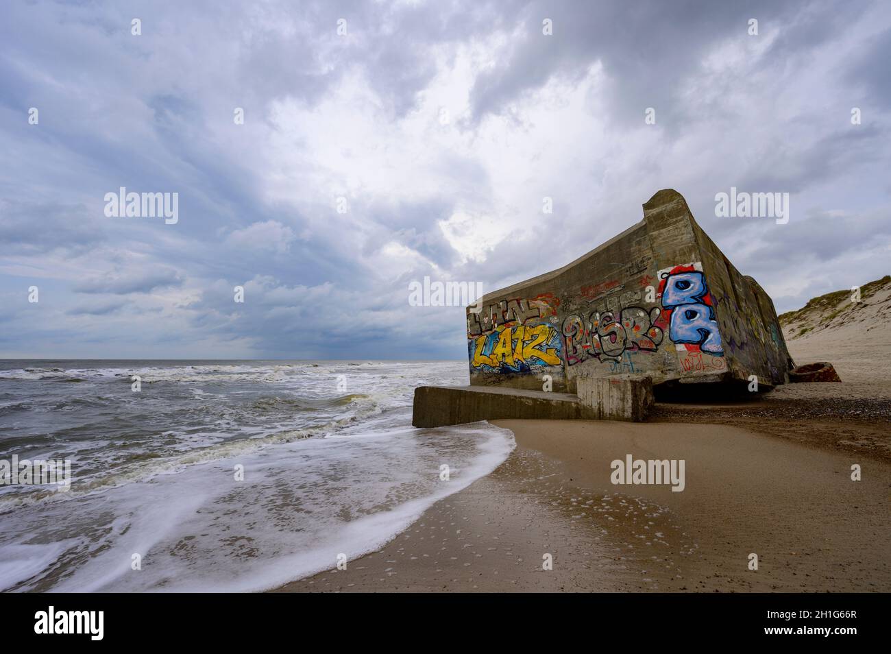 Coastal WWII bunkers from the Atlantic Wall, on the beach at Hvide Sande Denmark Stock Photo