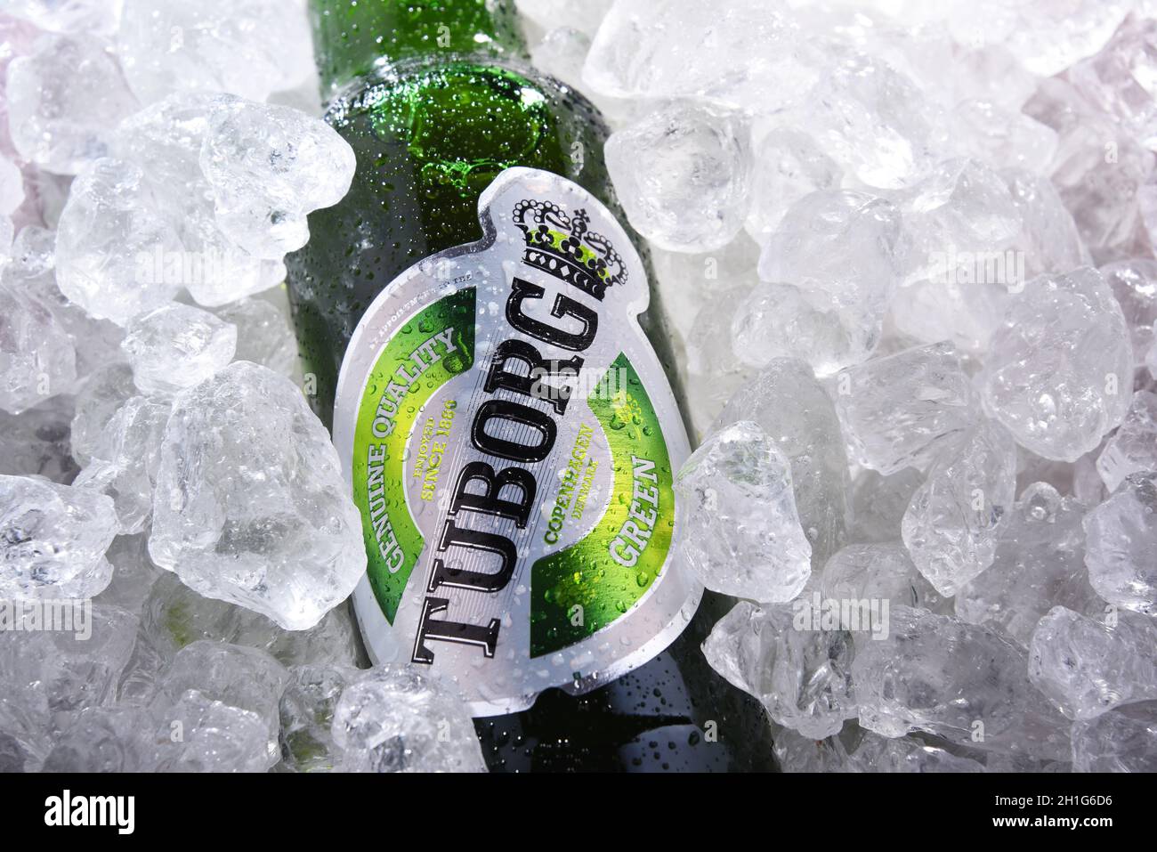 POZNAN, POL - JUN 10, 2020:  Bottle of Tuborg beer, produced by a Danish brewing company founded in 1873 near Copenhagen Stock Photo