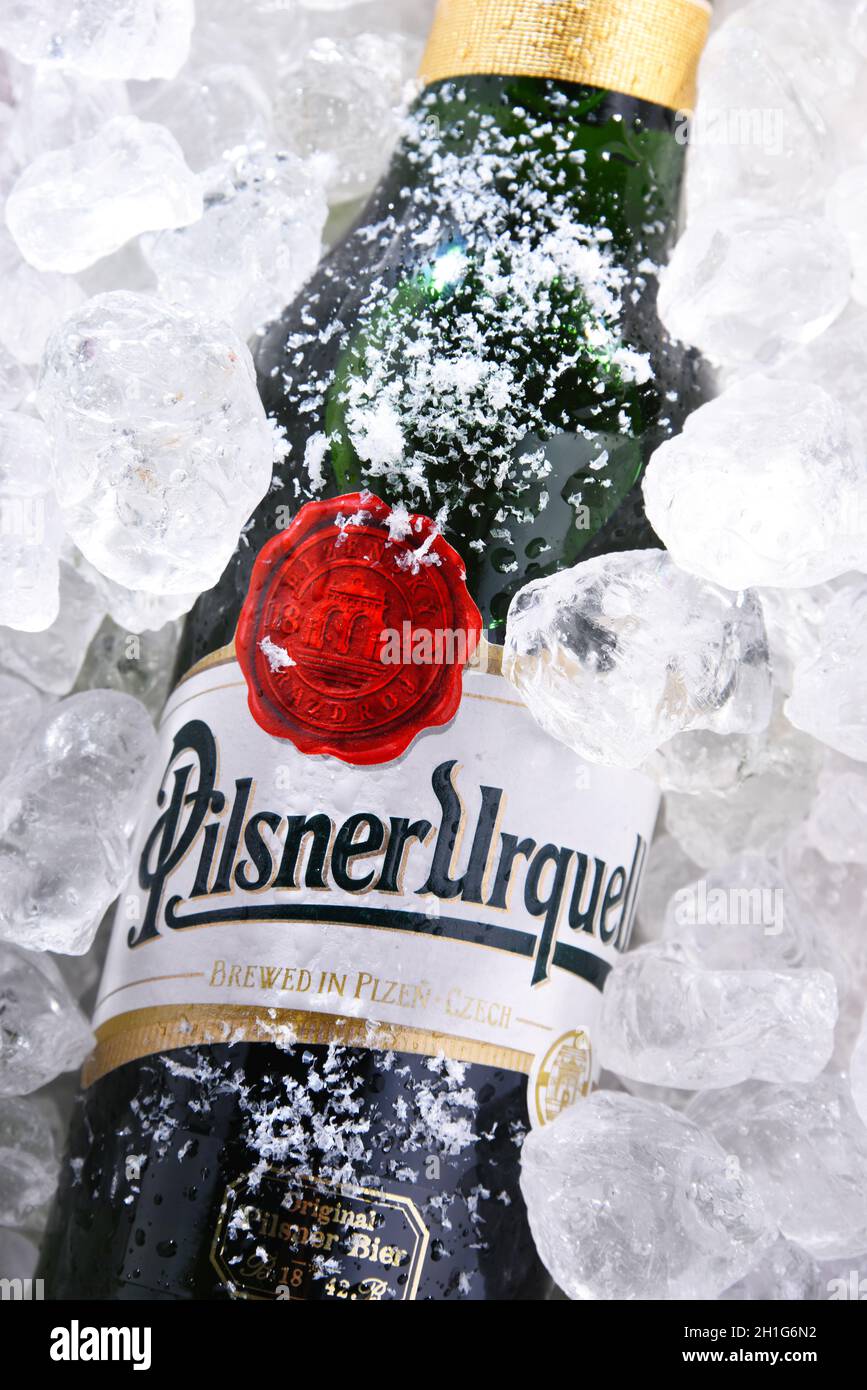 POZNAN, POL - MAY 28, 2020: Bottles of Plzensky Prazdroj, the first pilsner beer in the world, known better by its German name Pilsner Urquell Stock Photo
