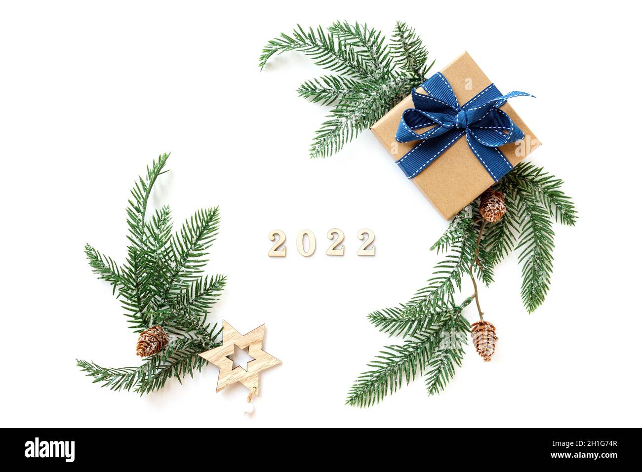 Xmas 2022 Composition With Present Box Decorations, Wooden Snowflakes, Fir Tree Branches. Merry Christmas White Background ,New Year Concept For Design Template Or Mockup With Copy Space Stock Photo - Alamy