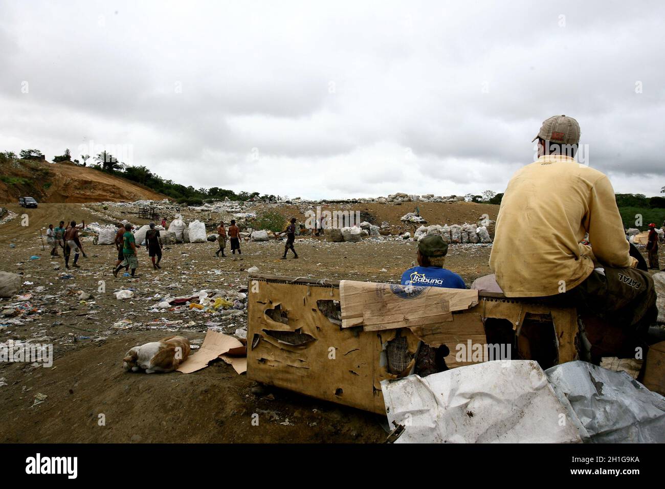 itabuna, bahia / brazil september 22, 2011 waste pickers watch their colleagues playing