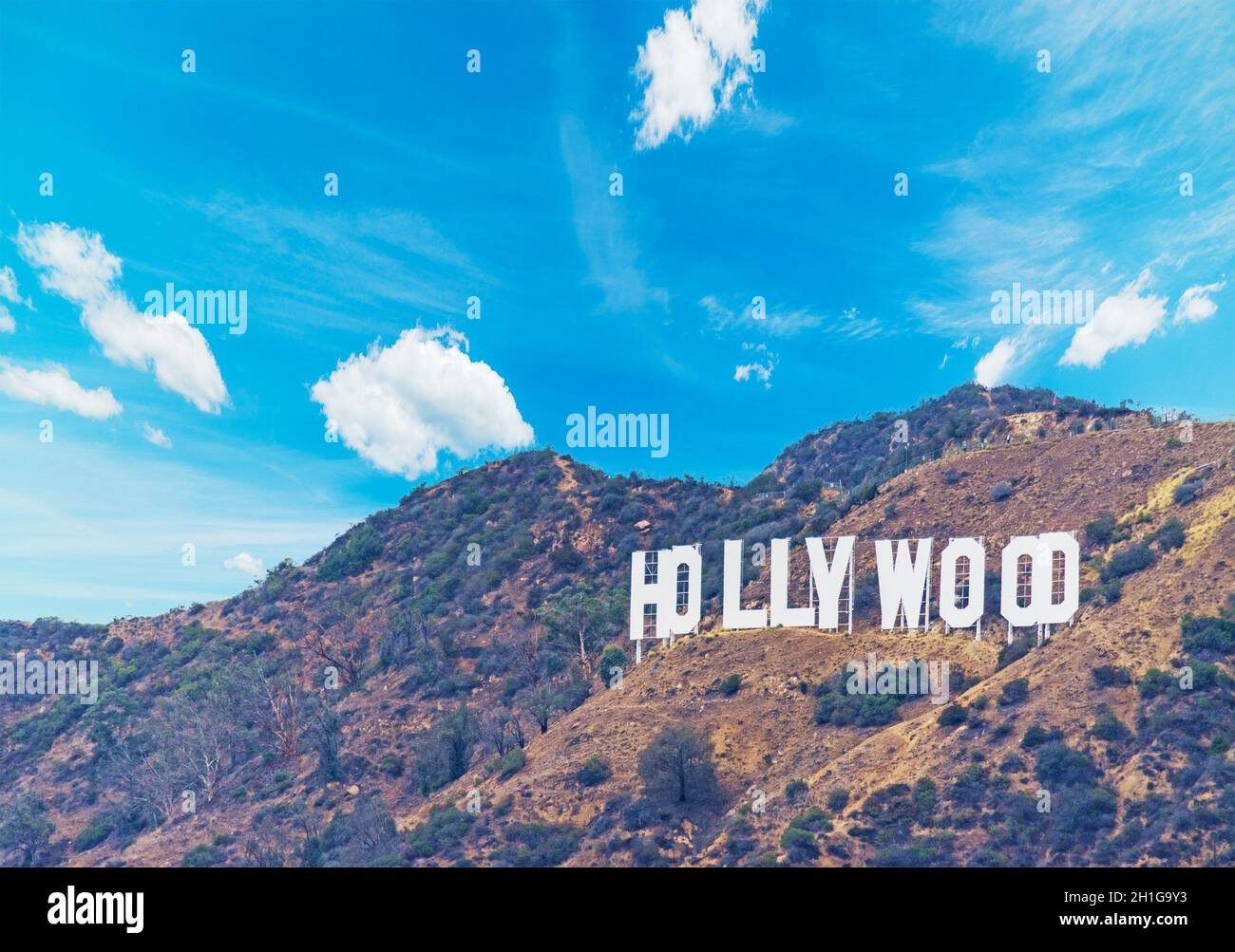 Hollywood sign under a blue sky with clouds, California Stock Photo