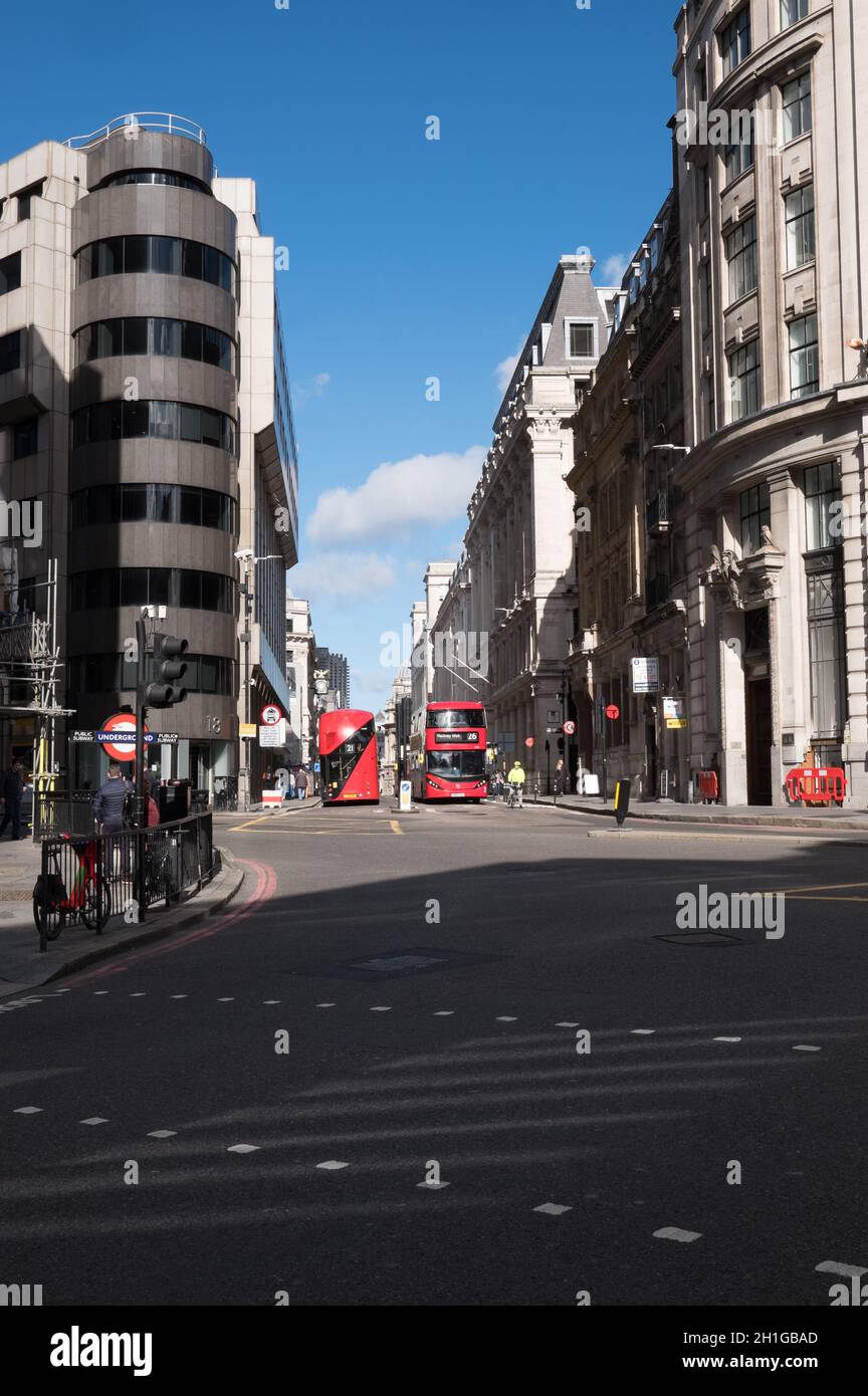 London Street with Red Buses Stock Photo