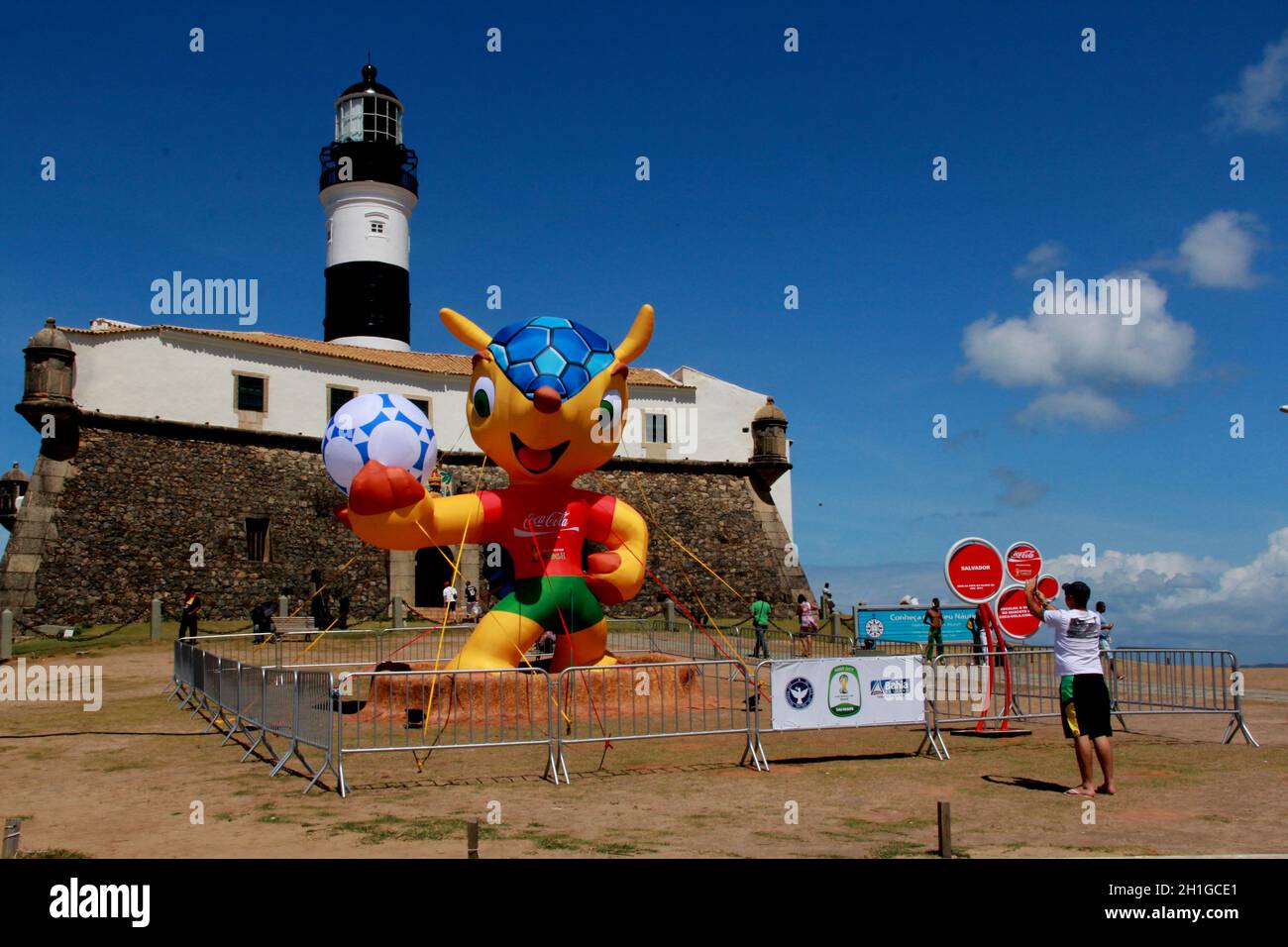 salvador, bahia / brazil - september 25, 2012: Fuleco, the mascot of the FIFA World Cup, is seen facing the Santo Antonio Fort, better known as Farol Stock Photo