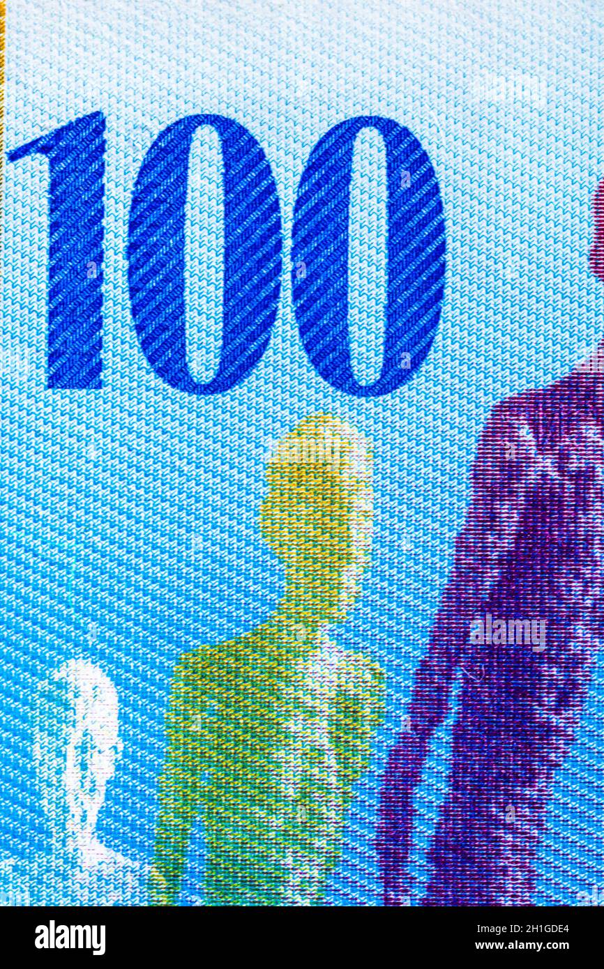 Selective focus on detail of CHF banknotes. Close up macro detail of ...