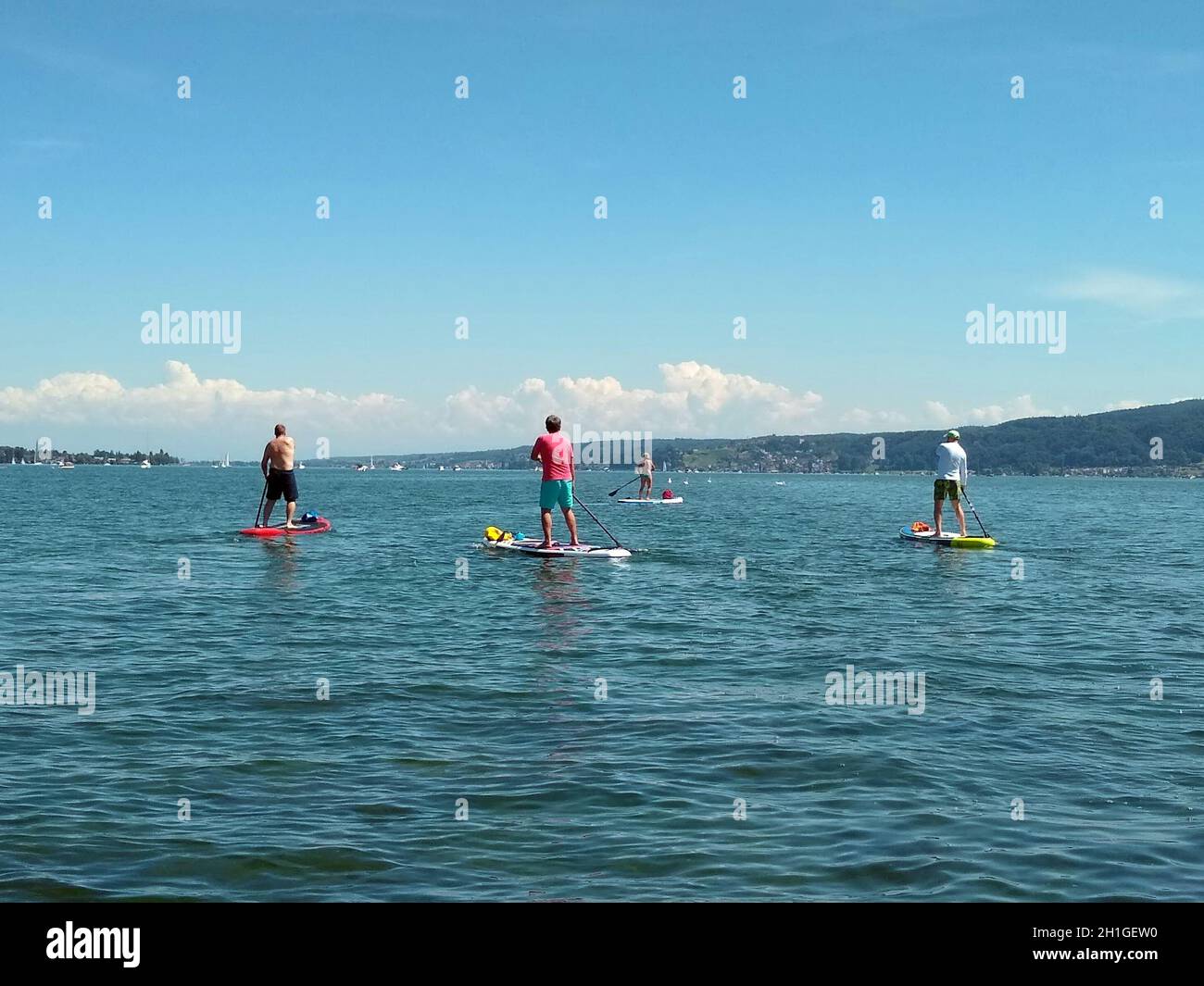 Stand Up Paddling auf dem Bodensee Urlaub in Deutschland Stock Photo