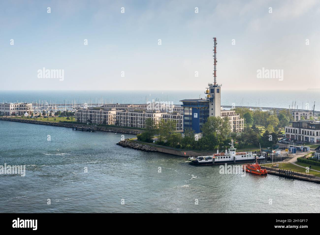 Rostock, Germany - May 26, 2017: View from the ship on the coast of Baltic Sea with a control tower in the port of Warnemunde, Rostock, Mecklenburg, G Stock Photo