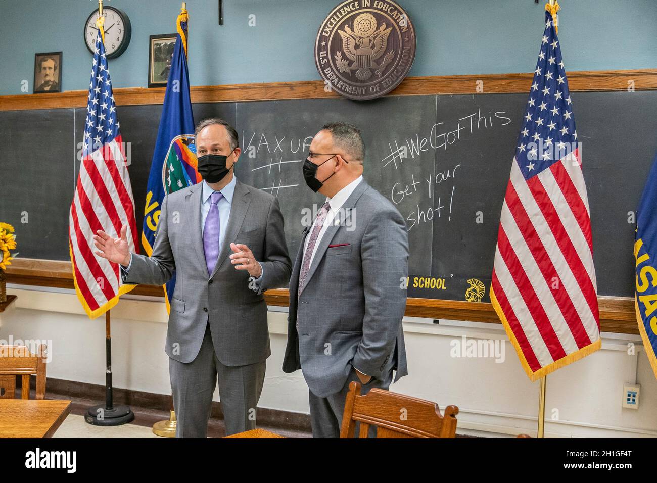 Topeka, United States of America. 09 August, 2021. U.S Second Gentleman Douglas Emhoff, left, and Education Secretary Miguel Cardona record a message about vaccines in a classroom at Topeka High School August 9, 2021 in Topeka, Kansas.  Credit: Katie Ricks/White House Photo/Alamy Live News Stock Photo
