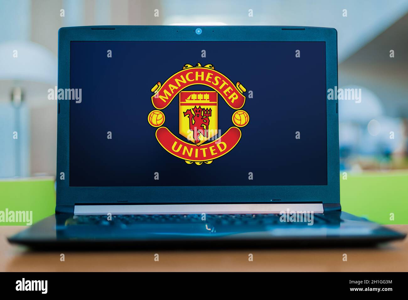 Manchester By Computer POZNAN, POL - JUL 11, 2020: Laptop computer displaying logo of ...