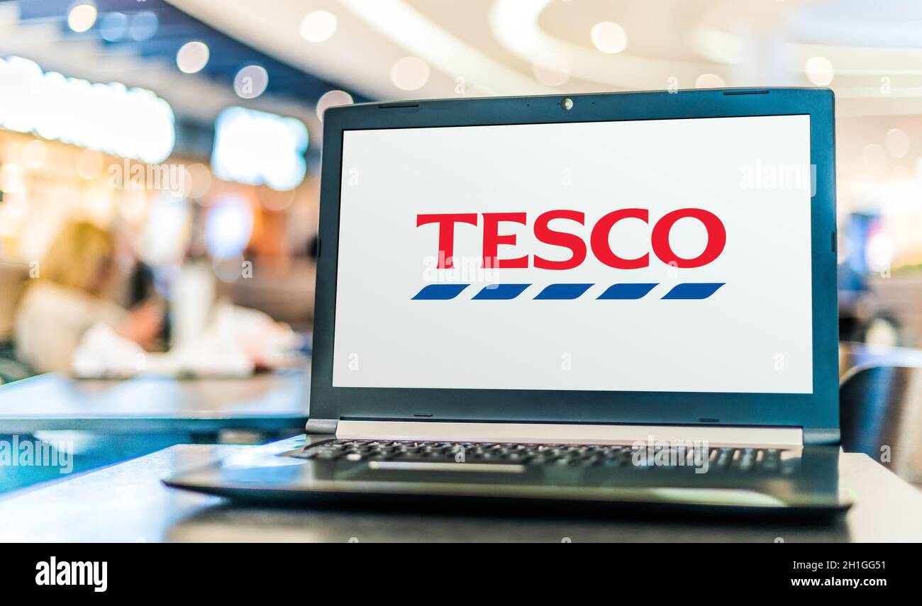 POZNAN, POL - MAY 15, 2020: Laptop computer displaying logo of Tesco, a ...