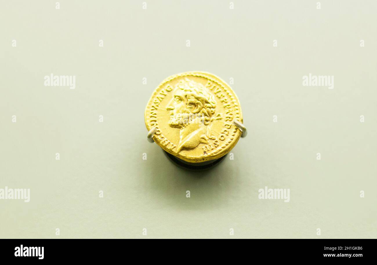 Merida, Spain - August 25th, 2018: Hadrian Roman Emperor gold coin. National Museum of Roman Art in Merida, Spain Stock Photo