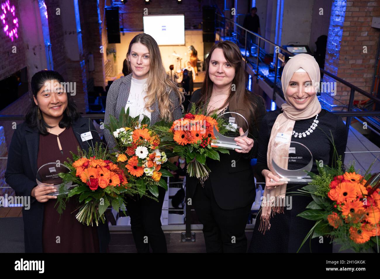 Dresden, Germany. 18th Oct, 2021. The award winners Drishti Maharjan (l-r),  Corina Hampel, Sarah-Lee Mendenhall and Houda El-Messari stand next to each  other at the award ceremony of the 11th Zeiss Women