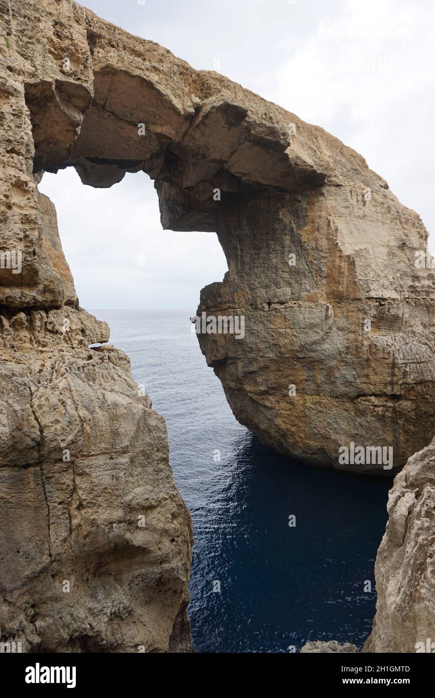 The Wied il-Mielah Window near Għarb on the mediterranean island of Gozo, Malta. Photo by Willy Matheisl Stock Photo