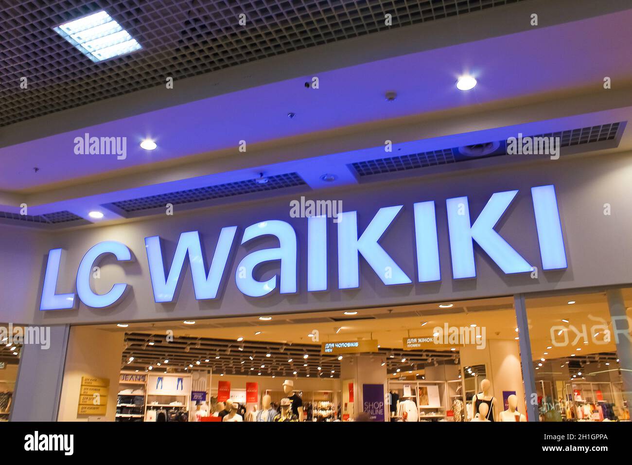 Kyiv, Ukraine - July 29, 2020: LC Waikiki retailer store with illuminated logo. Turkish clothes brand trading worldwide. Store view with window showca Stock Photo