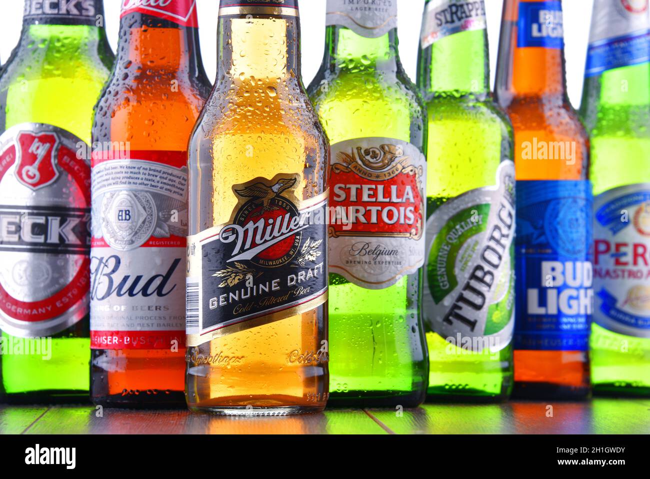 POZNAN, POL - JULY 19, 2018: Bottles of famous global beer brands including Heineken, Bud, Miller, Tuborg, Becks, Stella Artois, Peroni and San Miguel Stock Photo