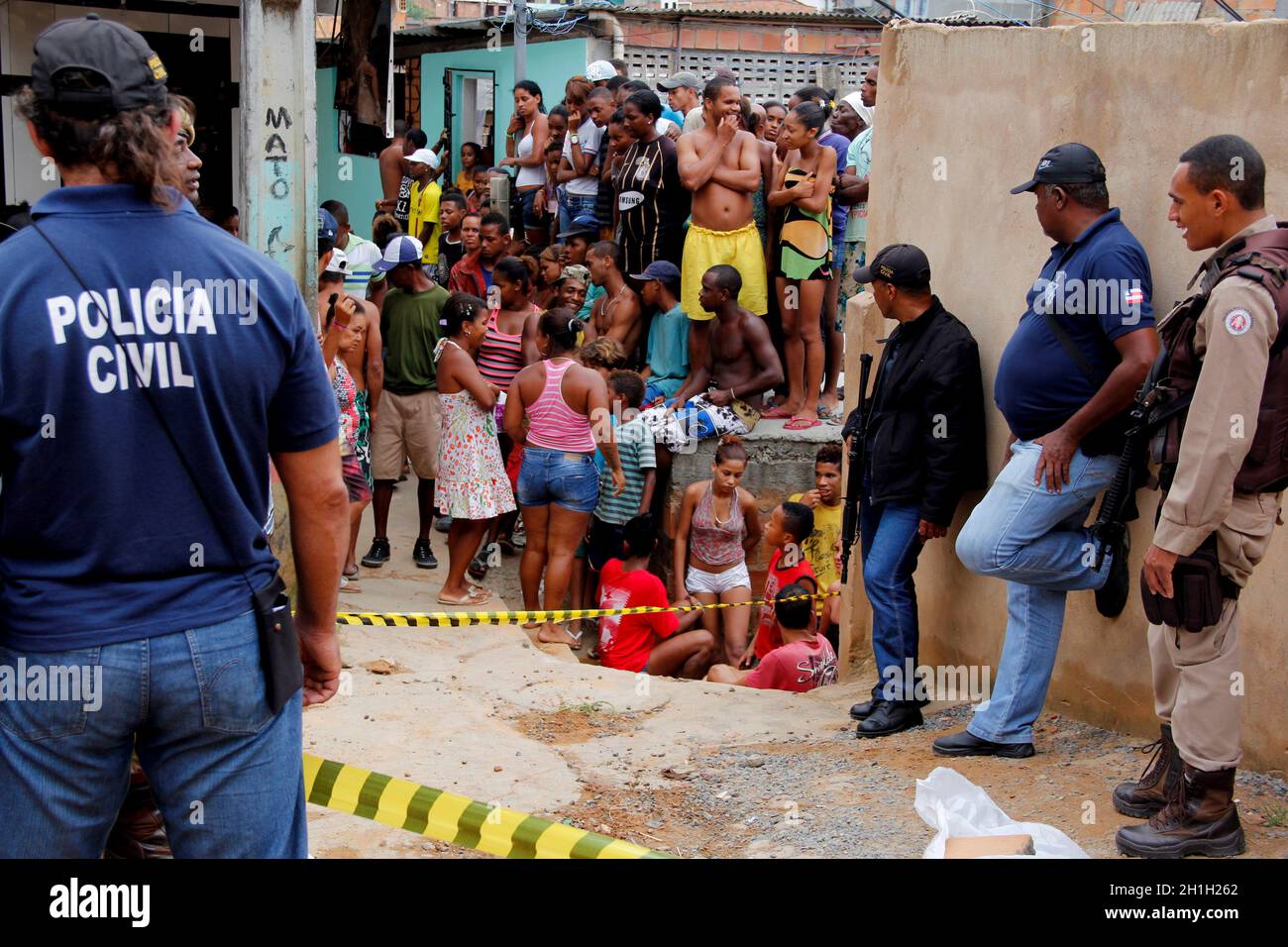 salvador, bahia / brazil - january 22, 2013: Civil police investigates the body of a murdered man in the Sussuarana neighborhood in the city of Salvad Stock Photo