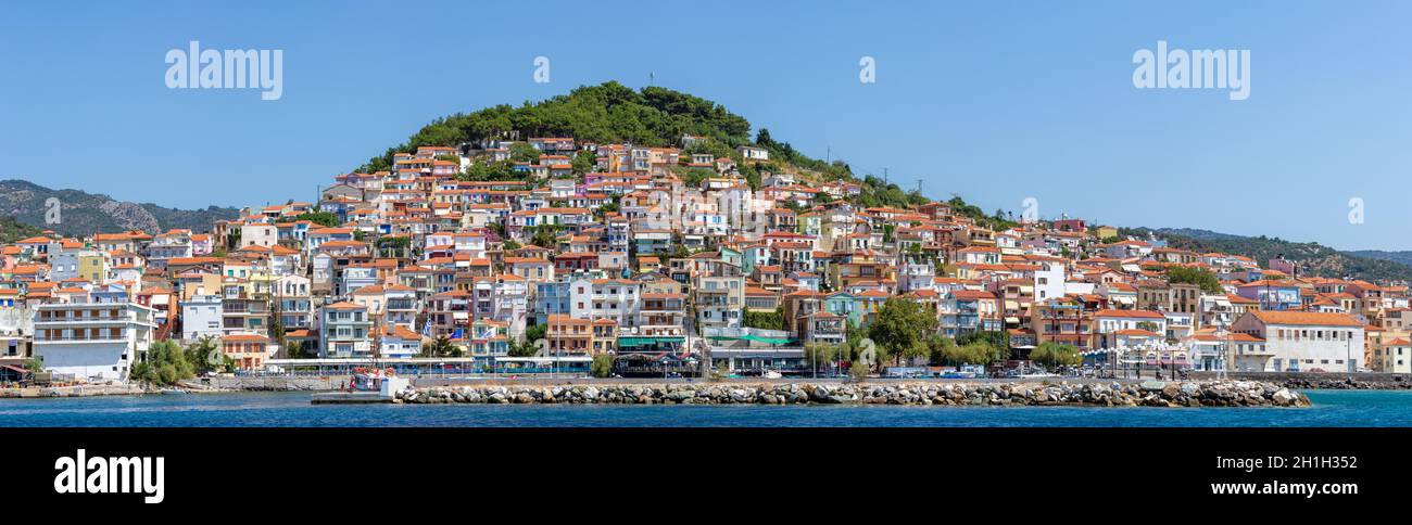 Plomari village, panoramic view of the 'home of ouzo', as it is called, due to the large tradition in making ouzo drink. In Lesvos island, Greece, Stock Photo